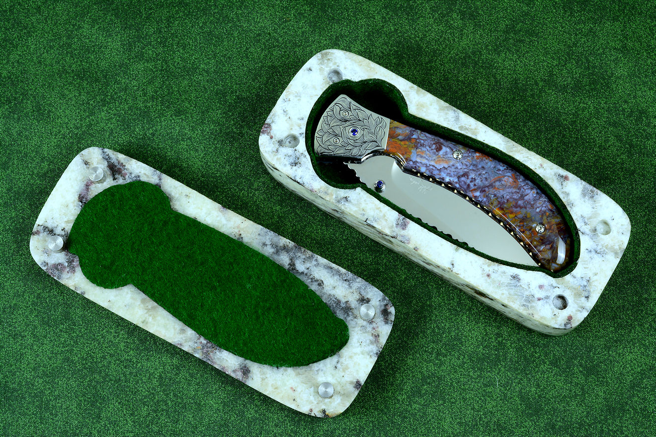 "Starling" granite with garnets and hornblende stone sarcophagus case with cabochons of Rio Grande Agate gemstone and stainless steel pins, polyester felt lining