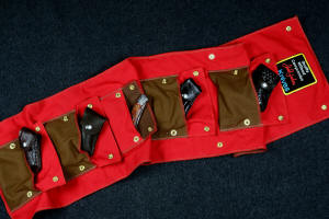 "Bellatrix" fine custom handmade folding knife and sheath roll, pocket details of inside. All edges are overstitched, each pocket is double layered attached to a triple layered backing