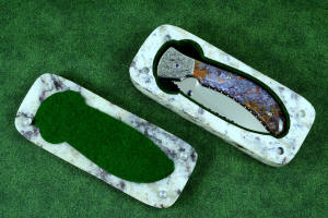 "Starling" granite with garnets and hornblende stone sarcophagus case with cabochons of Rio Grande Agate gemstone and stainless steel pins, polyester felt lining