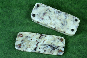 "Starling" bottom view with neoprene feet in granite with garnets and hornblende stone sarcophagus case with cabochons of Rio Grande Agate gemstone