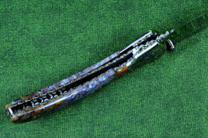 "Starling" fine handmade custom folding knife, lock view,  liner and blade filework detail. Note differentially anodized blue and gold titanium liners and full fine filework throughout