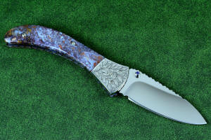 "Starling" fine handmade custom folding knife, reverse side view in high molybdenum stainless steel blade, engraved stainless bolsters, faceted amethyst gemstone accents and Rio Grande Agate handle