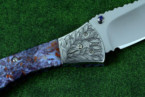 "Starling" fine custom handmade folding knife detail, reverse side, hand-engraved bolsters and fasteners, bezel-set faceted blue amethyst gemstone