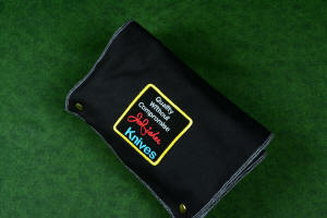 "Starling" fine handmade custom folding knife, sheath roll