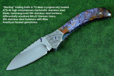 "Starling" fine handmade custom folding knife, obverse side view in high molybdenum stainless steel blade, engraved stainless bolsters, faceted amethyst gemstone accents and Rio Grande Agate handle